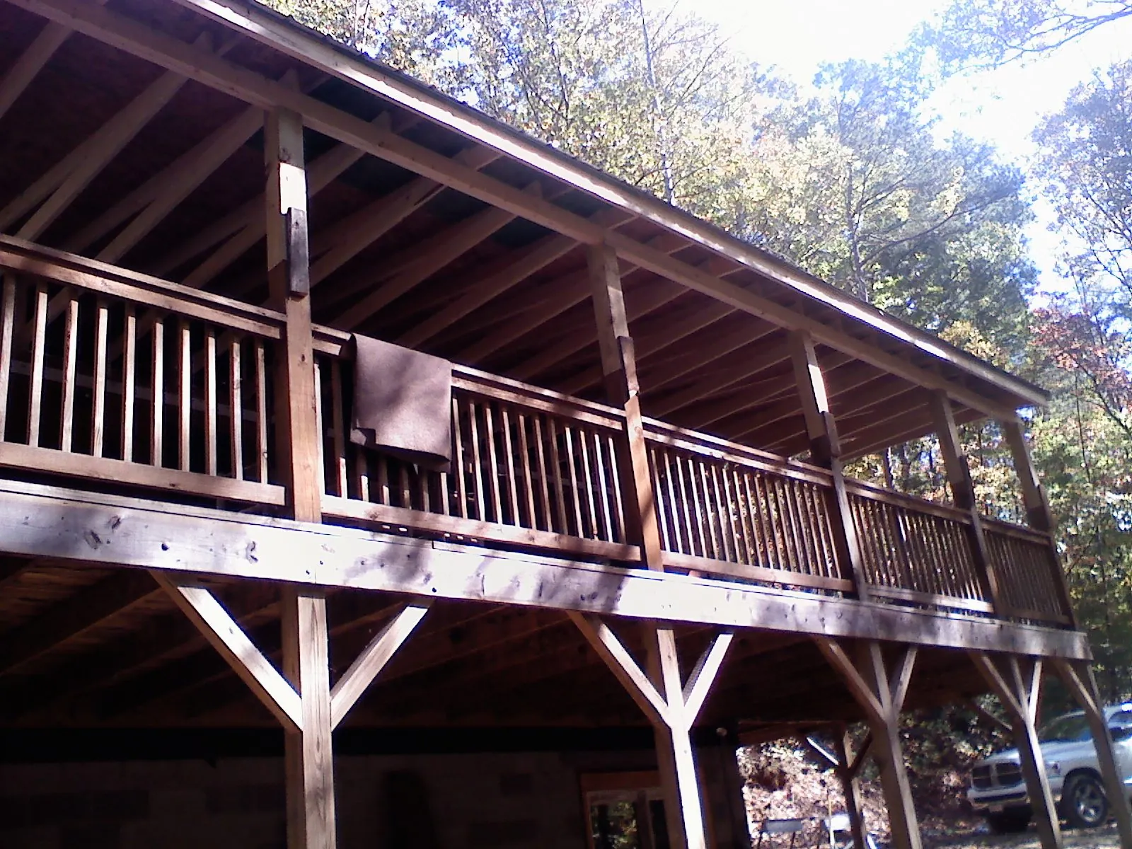 Timber framing under a new elevated porch and deck — Roof Leak Repair in Bonfield by Roofing Brothers